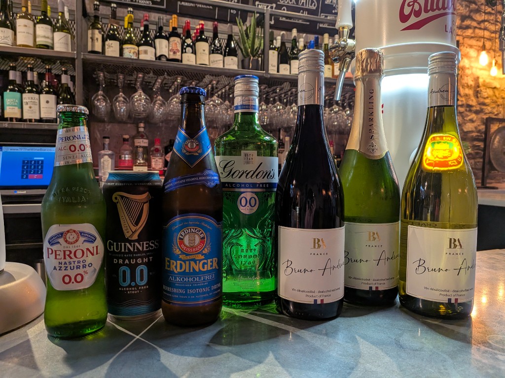 Selection of alcohol-free beers, gin and wines on the bar